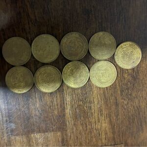 vintage Chuck E. Cheese arcade tokens.